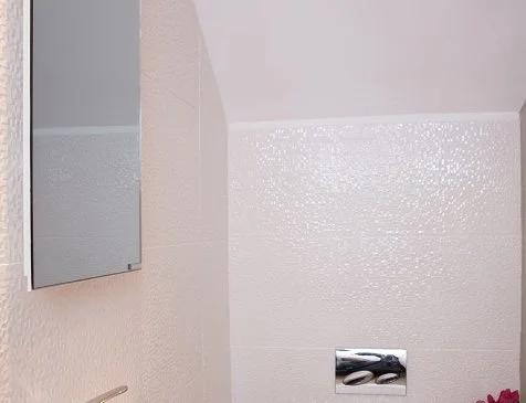 Calentador de espejo que ahorra espacio para baños pequeños
